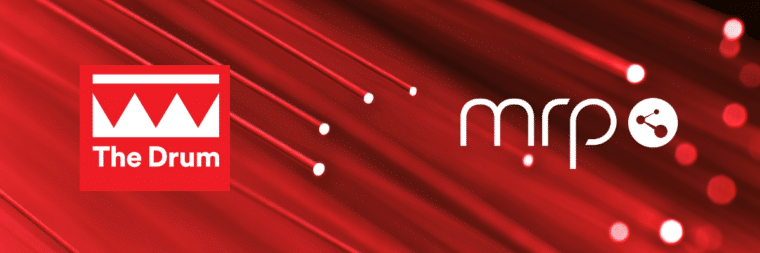 A red background that displays The Drum logo on the left side and the MRP logo on the right side.